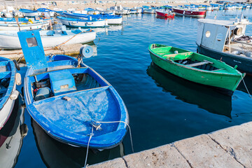Strolling along the streets of Gallipoli. Boats and places of a magical Salento