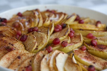 Close up of apple pie with goose berries. Macro image.