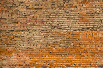 The texture of the old brick wall.