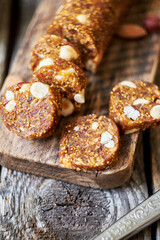 Fig and nut salami. Healthy vegan candy. Coffee