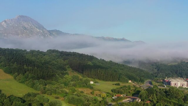 aerial view of the mountain and morning fog in the suburb of Durango, Basque Country.