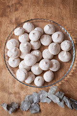 Homemade macarons. Side view, wooden background.