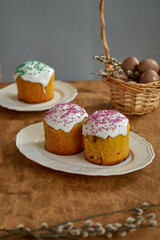 Easter cakes.  Festive mood. Side view, wooden background.