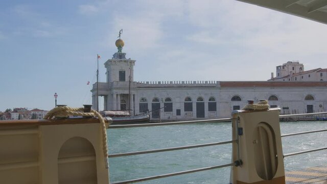 Punta della Dogana seen from inside the Vaporetto, with the ropes for the moorings and the steel gates that open to let people get on and off.