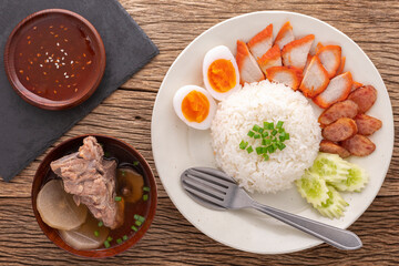 Khao Mu Daeng, Khao Moo Dang, Thai food, streamed rice with red barbecued pork serve with sweet gravy sauce, egg, Chinese sausage, cucumber, soup from pork bone, radish and shiitake mushroom, Char Siu