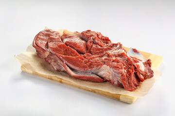 Raw beef meat over board