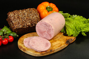 Pork ham sausage cut isolated