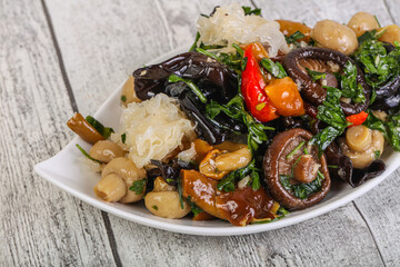 Pickled asian mushroom mux with herbs