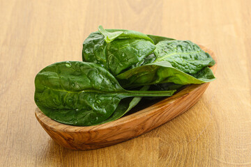 Fresh green spinach leaves in the bowl