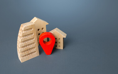 Residential buildings and a red location pin. Location, accessibility and proximity to...