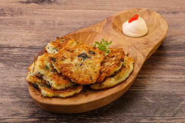 Zucchini pancakes with herbs and spices