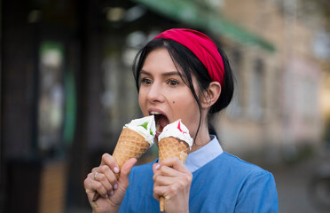 Woman eating ice cream. Happiness. Ice cream. Model. Background. Dessert. 