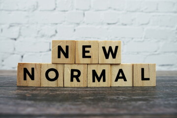 New Normal word alphabet letters on wooden background