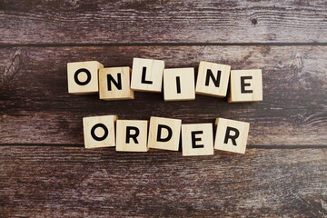 Naklejka premium Online Order word alphabet letters on wooden background