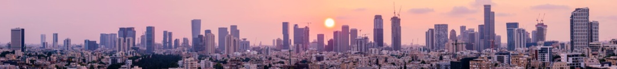 Fototapeta premium Tel Aviv Skyline At Sunset, Tel Aviv Cityscape Large Panorama At Sunset Time, Israel
