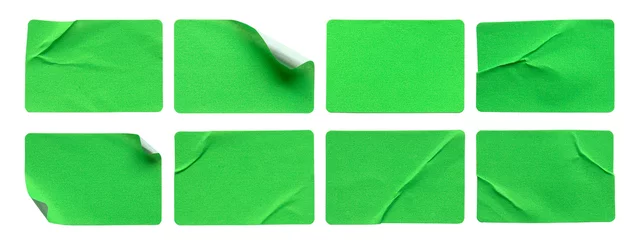Fotobehang A set of green rectangular paper sticker label isolated on white background. © MohamadFaizal