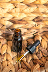 Product photo of cbd oil drops, pipette, sunshine 