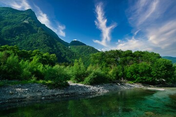 Mountain landscape view with clear river in the summer in Nagano, Japan