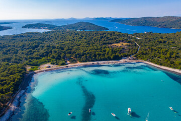 Aerial view of sailing boats in a beautiful azure turquoise lagoon on Sakarun beach bay on Dugi Otok island, Croatia, beautiful seascape