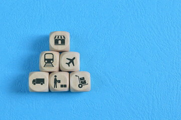 Wooden cube blocks with logistic delivery symbols