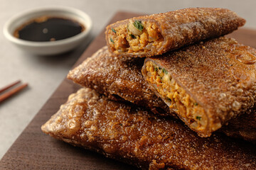 Buckwheat pancakes with kimchi inside and wrapped in buckwheat dough