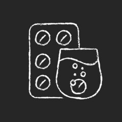 Effervescent tablet for cold relief chalk white icon on dark background. Cough-and-cold medication. Dissolve in liquid. Release carbon dioxide. Isolated vector chalkboard illustration on black
