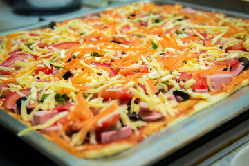 Appetizing pizza prepared for baking