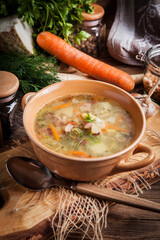 Pea soup with vegetables and bacon.