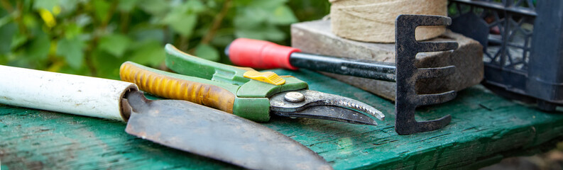 tools of the gardener. Concept of gardening or planting. banner.selective focus