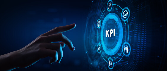 KPI Key Performance Indicator. Hand pressing button on screen.