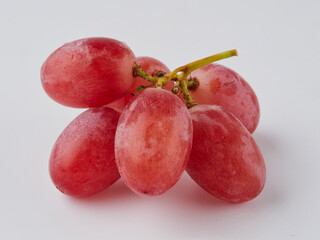 Grapes. Red grape. Grape branch isolated on white. With clipping path. Full depth of field.