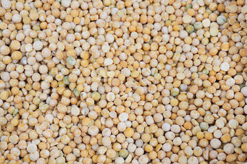 Raw chickpeas in sack. A sack of split peas. Organic food at farmers market. Vegetarian food concept.