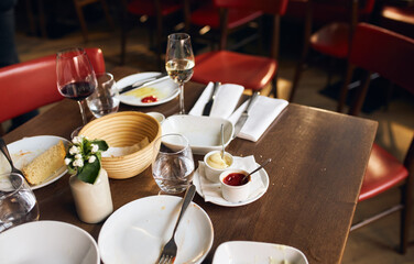 Used plates on table in restaurant after meal