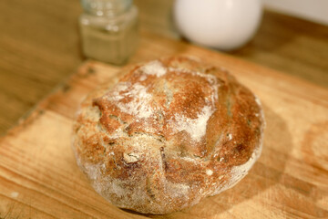 Homemade sourdough bread in a conventional oven. - 449174975