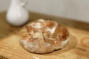 Homemade sourdough bread in a conventional oven. - 449175145