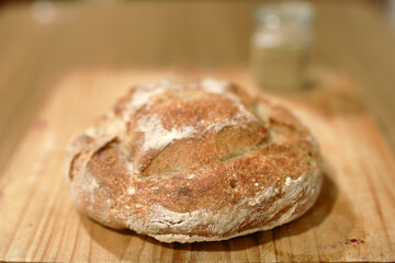 Homemade sourdough bread in a conventional oven. - 449175170