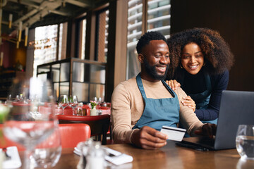 Restaurant owners using credit card online