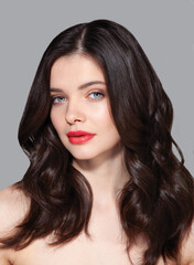 Naklejka premium Beauty portrait of young woman with beautiful hair and healthy skin, natural make-up
