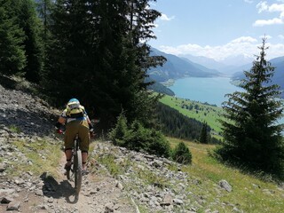 Mountain biking in the beautiful valleys and landscapes of South Tyrol in the Dolomites in Northern Italy