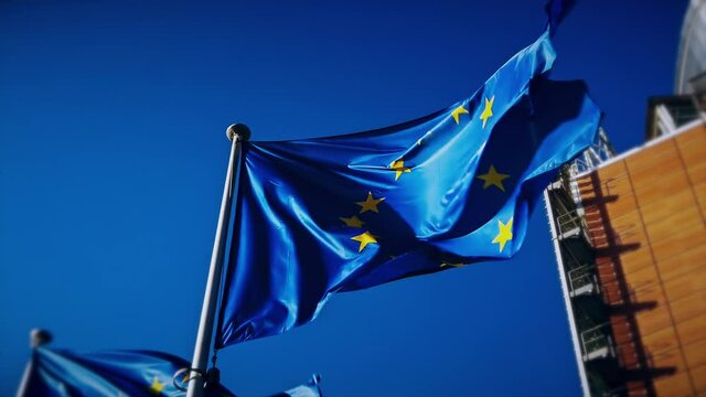 Slow motion close up of waving EU flags. Brussels, Belgium. 4K