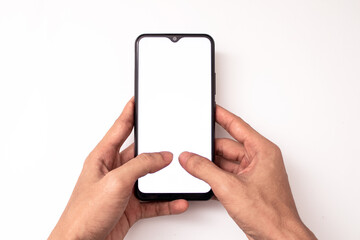 holding a phone on a white background