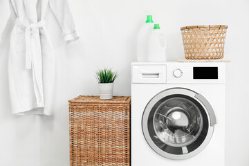 Modern washing machine in bathroom