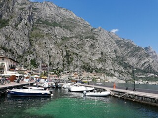 Fototapeta na wymiar The stunning landscape around the small harbour towns in Lake Garda in Northern Italy, Europe