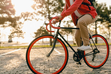 handsome bearded man traveling with bicycle in morning