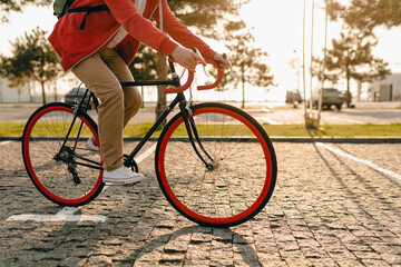 handsome bearded man traveling with bicycle in morning