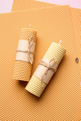 Handmade wax candles on table