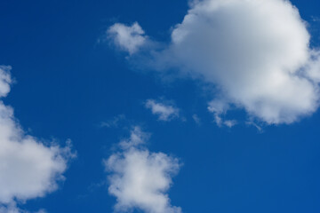 Naklejka na ściany i meble Beautiful blue sky with clouds as a background picture