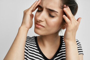 Fototapeta premium brunette with headache health problems medicine stress