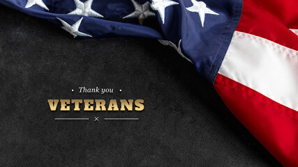 Top view Flag of the United States of America on black textured background. Memorial Day and Veterans Day concept.