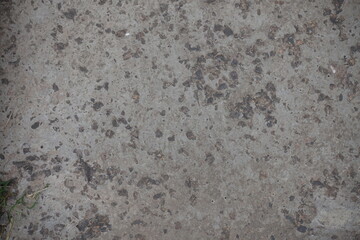 Rough surface f old gray concrete slab from above